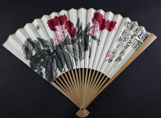 A Chinese bamboo and painted leaf fan, 31.5cm